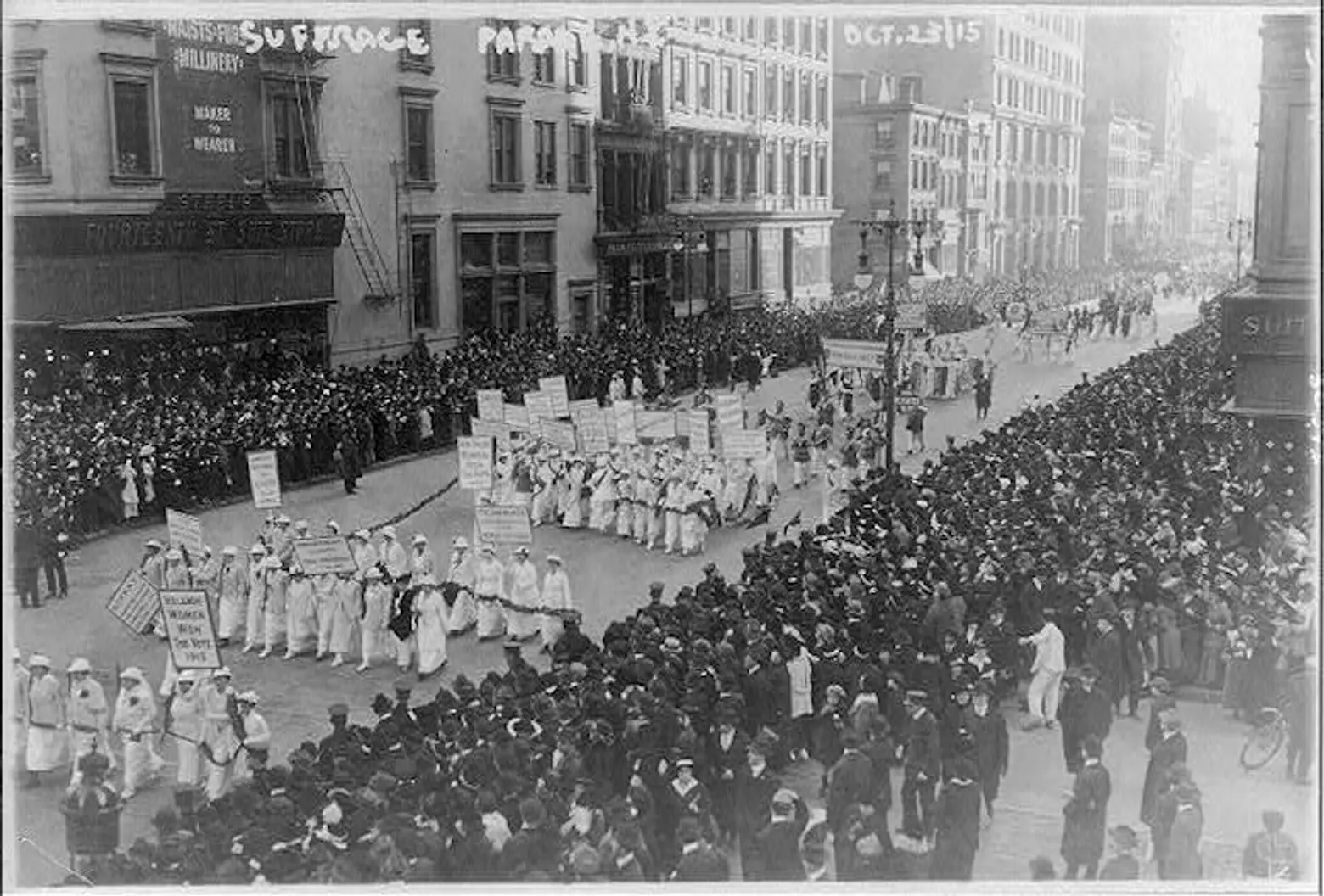 A 1915 suffrage march down a New York City avenue